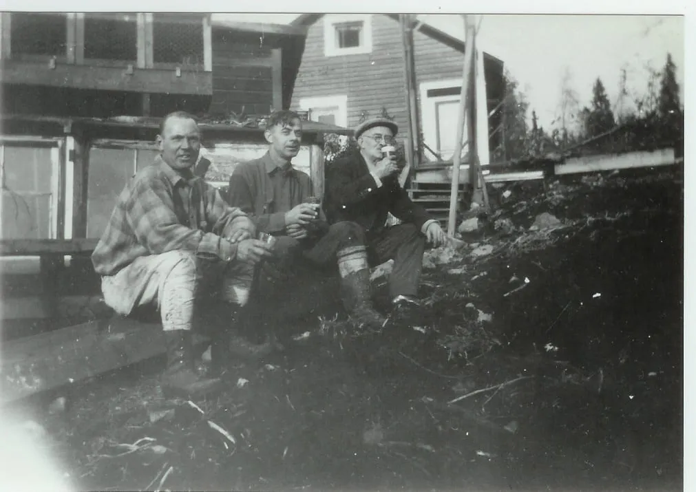 Chris Jensen & Friends in front of cottage